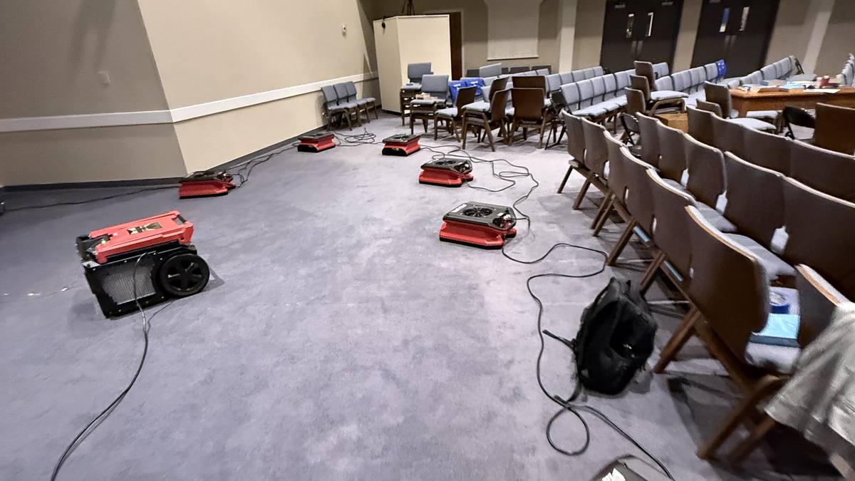 Water damage restoration underway in a Charleston church sanctuary